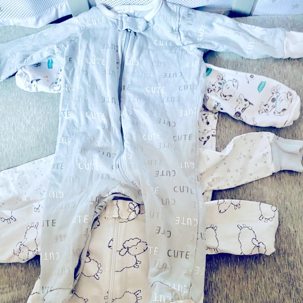4 pieces of 0-3 months gender neutral footies. They are washed but never worn.